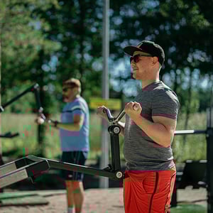 Guys working out at Matinkylä beach outdoor gym